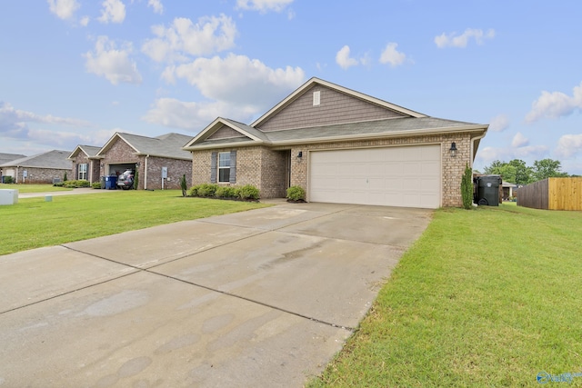 117 Hank Ct, Hazel Green, AL 35750 - view of front of house with an attached garage, driveway, and brick siding