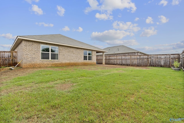 117 Hank Ct, Hazel Green, AL 35750 - back of property with a fenced backyard and brick siding