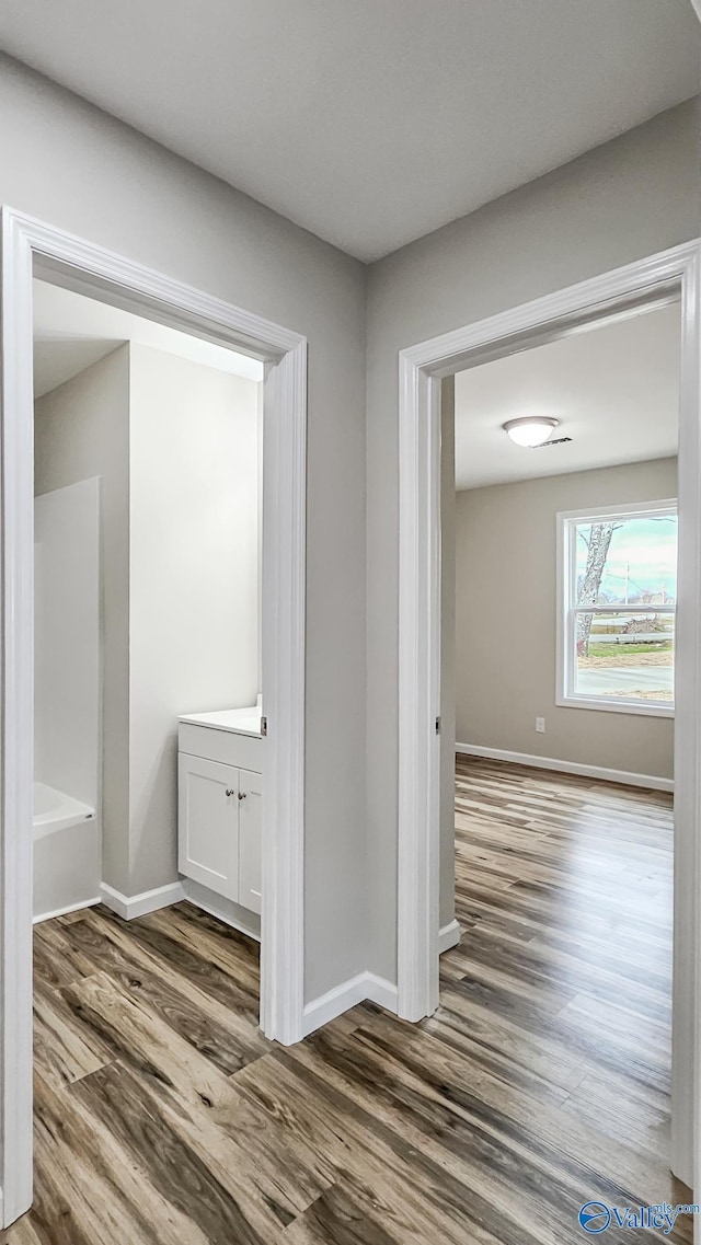 hall featuring hardwood / wood-style flooring