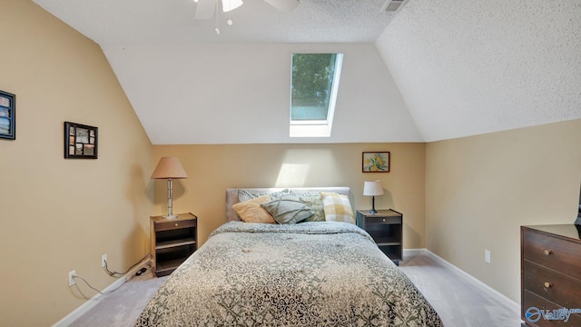 114 Spring Water Dr, Madison, AL 35758 - bedroom with light colored carpet, lofted ceiling, baseboards, a textured ceiling, and ceiling fan