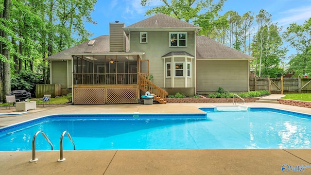 114 Spring Water Dr, Madison, AL 35758 - view of swimming pool with a sunroom, a patio, and a gate