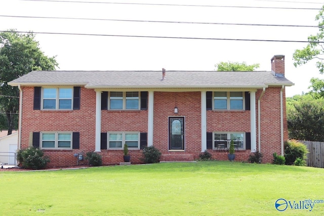 5627 SW Alta Dena St, Huntsville, AL 35802 - bi-level home featuring a chimney and brick siding