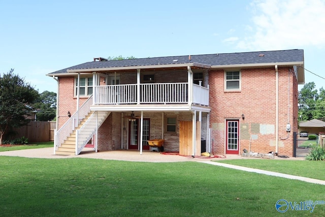5627 SW Alta Dena St, Huntsville, AL 35802 - back of house featuring a patio, brick siding, and stairway