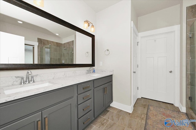 bathroom with vanity and an enclosed shower