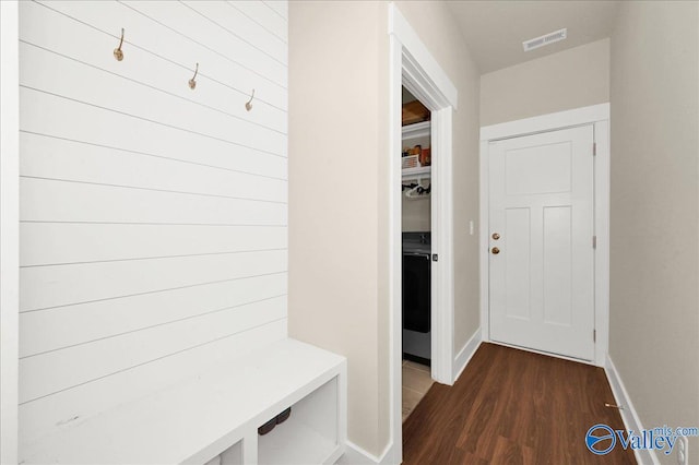 mudroom with dark hardwood / wood-style flooring