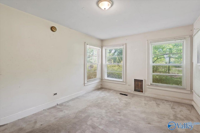 view of carpeted spare room