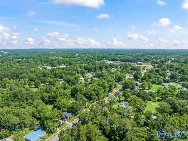 aerial view featuring a view of trees