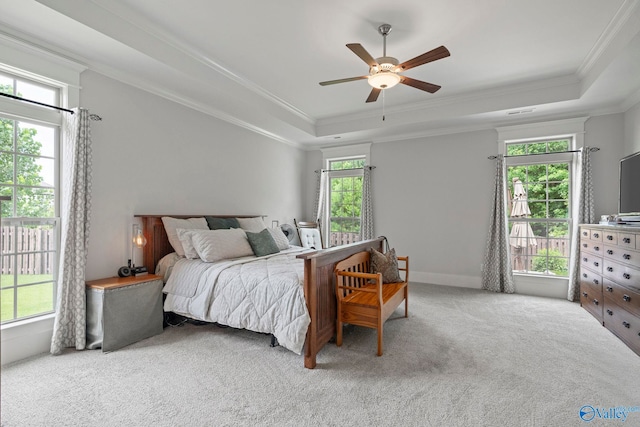 155 Holbrook Dr, Huntsville, AL 35806 - carpeted bedroom featuring a raised ceiling, ornamental molding, and a ceiling fan