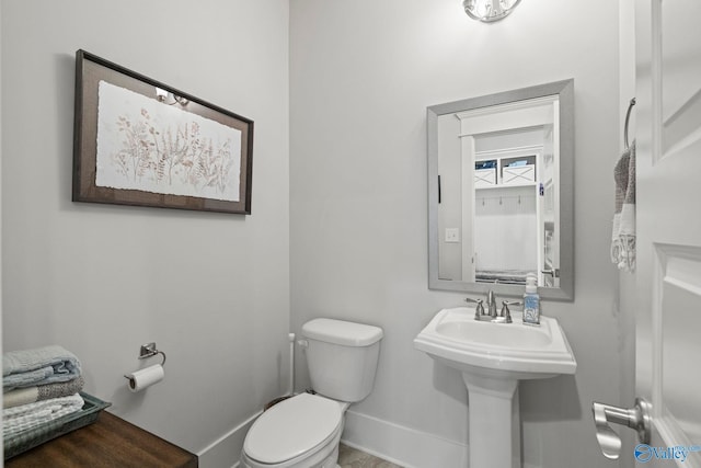 155 Holbrook Dr, Huntsville, AL 35806 - bathroom featuring toilet and baseboards