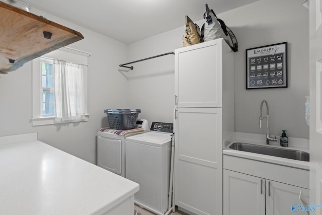 155 Holbrook Dr, Huntsville, AL 35806 - laundry room with washing machine and clothes dryer and cabinet space