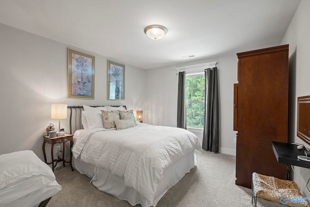 155 Holbrook Dr, Huntsville, AL 35806 - bedroom featuring light carpet and baseboards