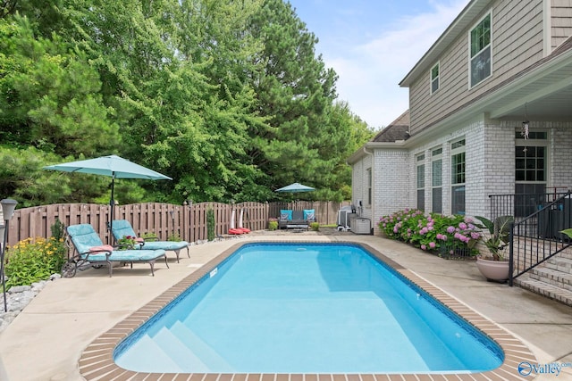 155 Holbrook Dr, Huntsville, AL 35806 - view of swimming pool featuring a patio