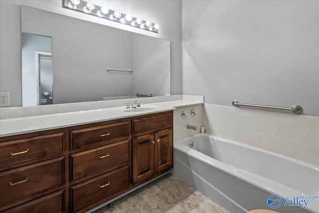 bathroom featuring a bath and vanity