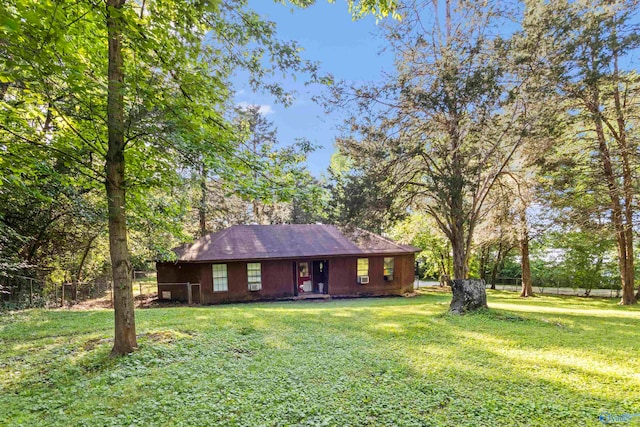 view of home's exterior featuring a lawn