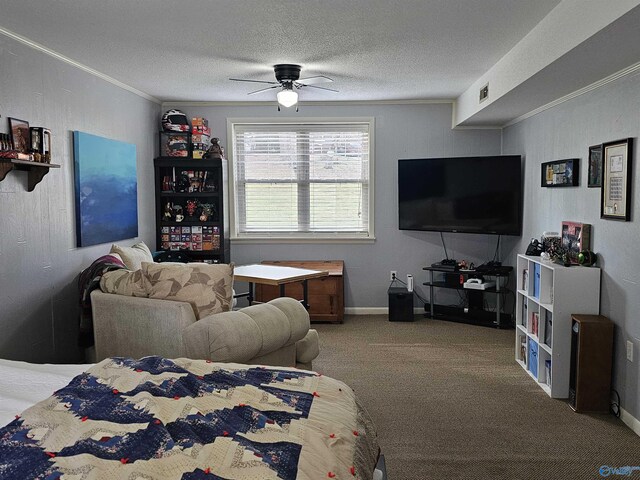 carpeted bedroom with ceiling fan, crown molding, and a textured ceiling