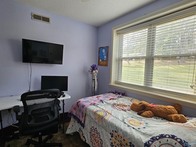 bedroom with a textured ceiling