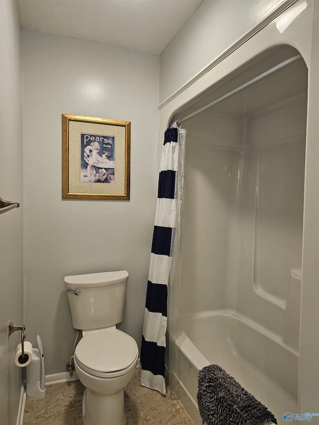 bathroom featuring toilet and shower / bath combination with curtain