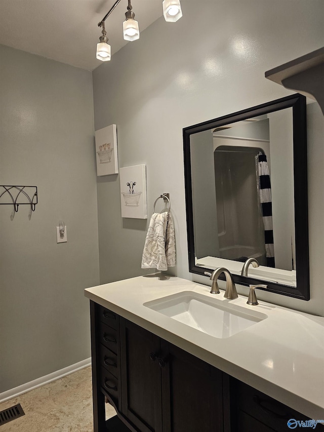 bathroom featuring vanity