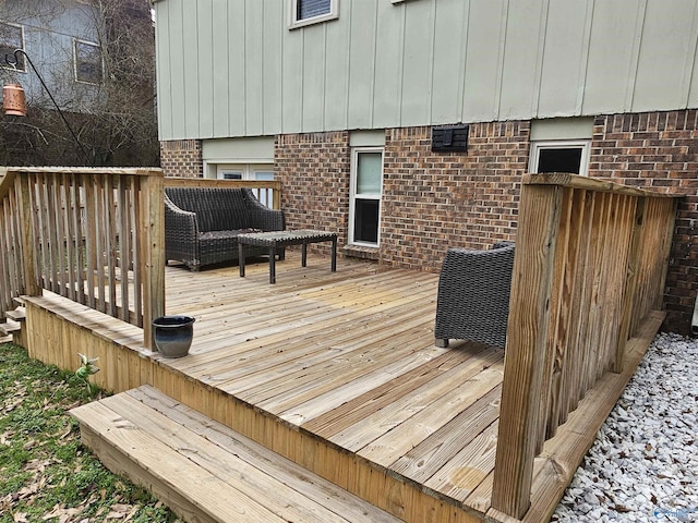 wooden deck featuring outdoor lounge area