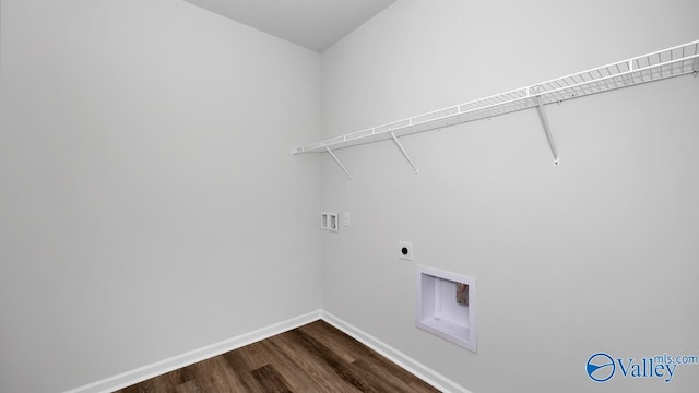 clothes washing area featuring electric dryer hookup, hookup for a washing machine, and wood-type flooring