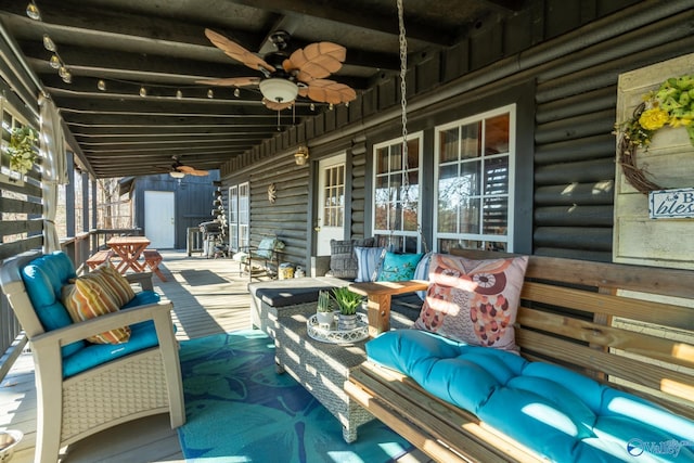 deck with a porch and an outdoor living space