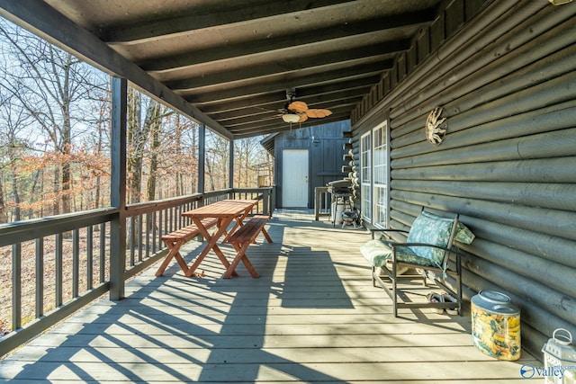 wooden terrace with ceiling fan