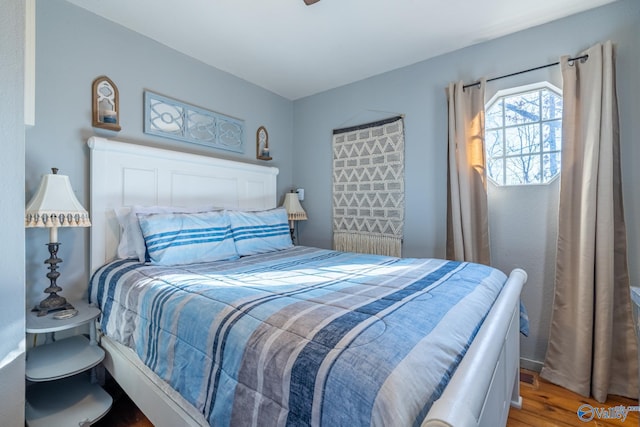 bedroom featuring hardwood / wood-style floors