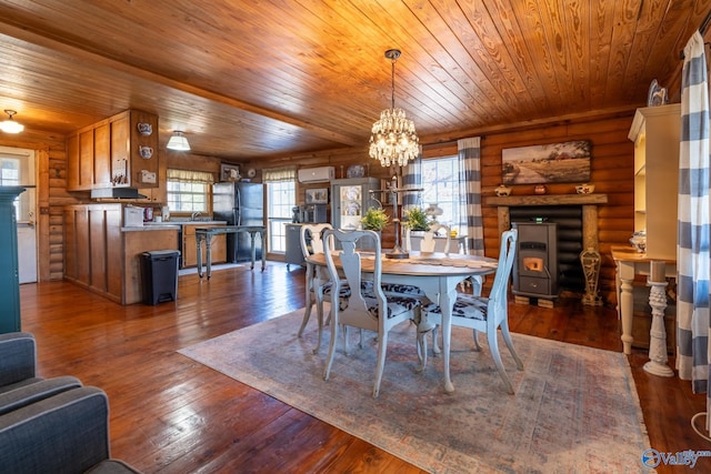 dining room featuring dark hardwood / wood-style floors, wooden ceiling, log walls, and an inviting chandelier