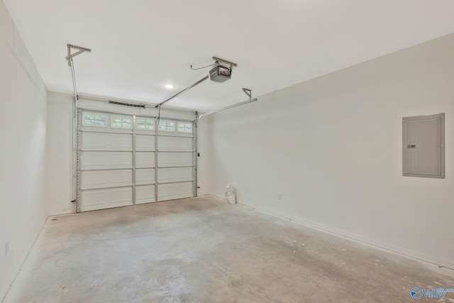 garage featuring a garage door opener and electric panel