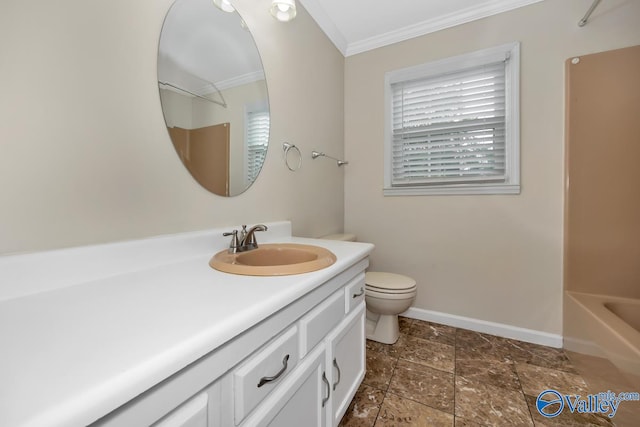 bathroom featuring toilet, vanity, and crown molding