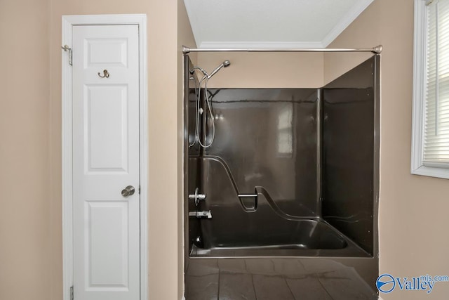 bathroom featuring walk in shower and crown molding