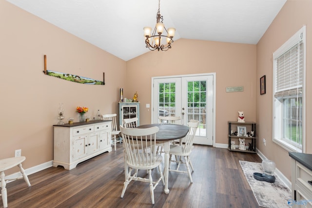 7110 New Bethel Rd, Hokes Bluff, AL 35903 - dining space with a chandelier, dark wood finished floors, french doors, lofted ceiling, and baseboards