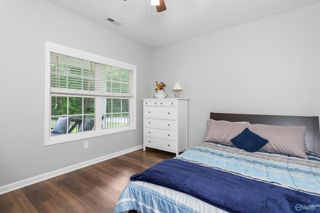 7110 New Bethel Rd, Hokes Bluff, AL 35903 - bedroom with wood finished floors, baseboards, and ceiling fan