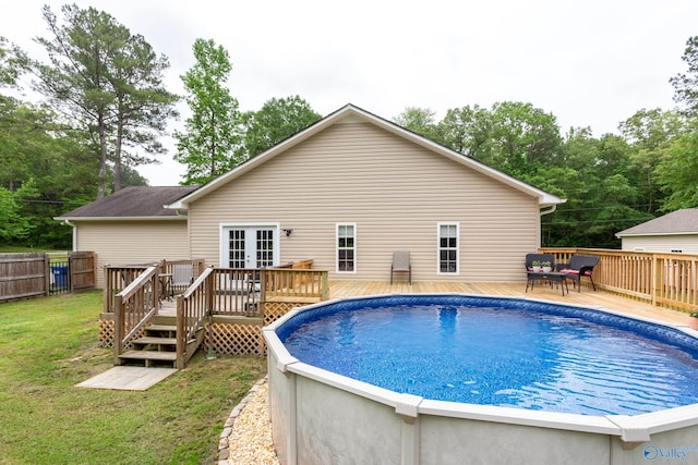 7110 New Bethel Rd, Hokes Bluff, AL 35903 - view of swimming pool featuring french doors and a wooden deck