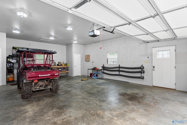 7110 New Bethel Rd, Hokes Bluff, AL 35903 - garage featuring a garage door opener