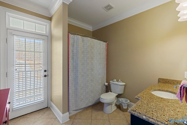 bathroom with ornamental molding, toilet, vanity, and tile patterned flooring