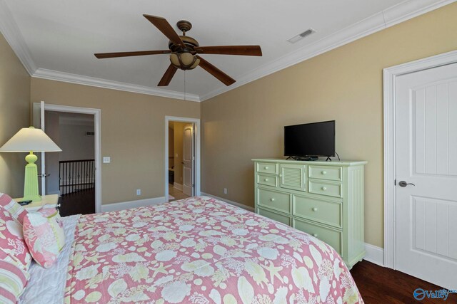 bedroom featuring dark wood-type flooring, ceiling fan, and ornamental molding