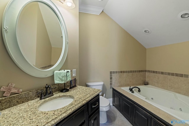 bathroom featuring vanity, tile patterned floors, a bathing tub, vaulted ceiling, and toilet