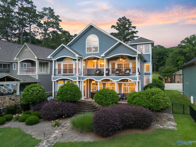 view of front of property featuring a balcony