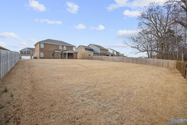 view of yard featuring a garage