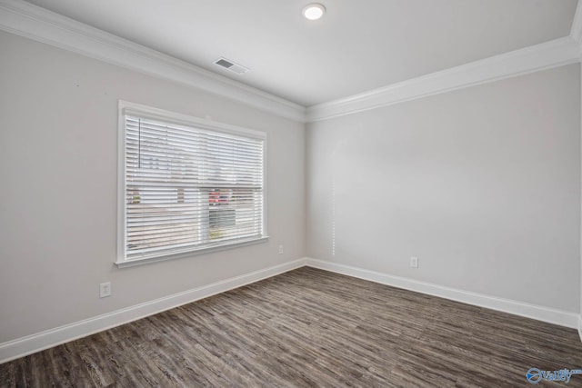 unfurnished room featuring crown molding and dark wood-type flooring