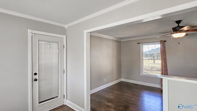 unfurnished room with ceiling fan, dark hardwood / wood-style flooring, and ornamental molding