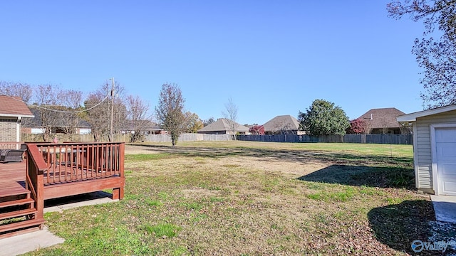 view of yard with a wooden deck