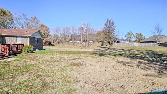 view of yard featuring a deck