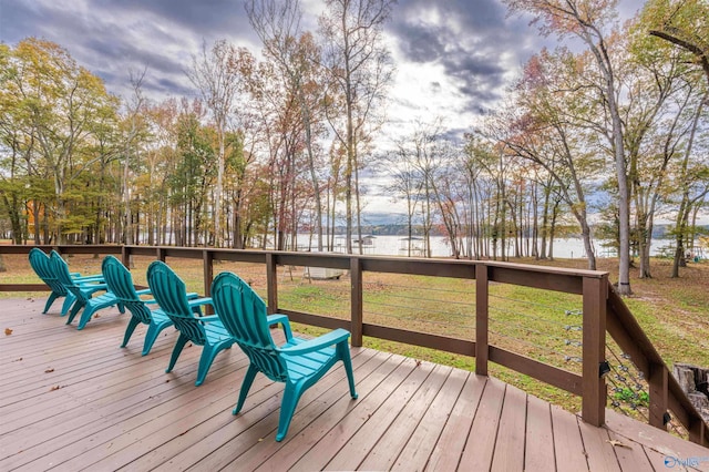 deck featuring a water view