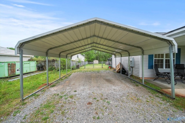 1004 Carter Grove Rd, Hazel Green, AL 35750 - view of parking with fence and a carport