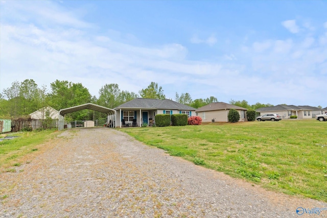 1004 Carter Grove Rd, Hazel Green, AL 35750 - ranch-style home featuring a carport, gravel driveway, and a front yard