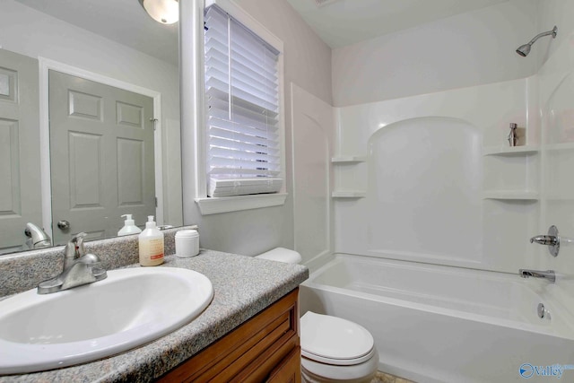 full bathroom with vanity, shower / bathing tub combination, and toilet