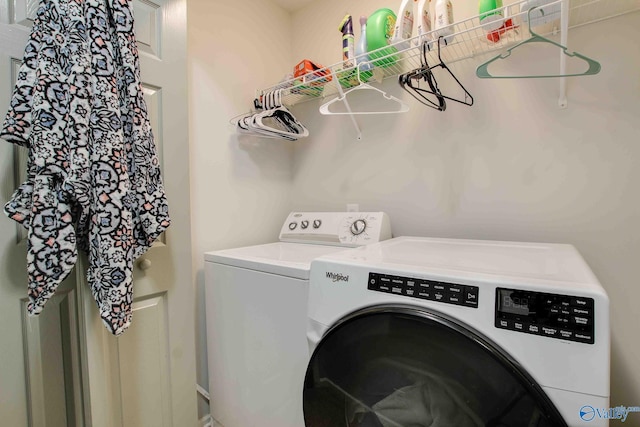 washroom with washing machine and dryer