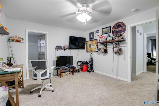 office area with ceiling fan and light colored carpet